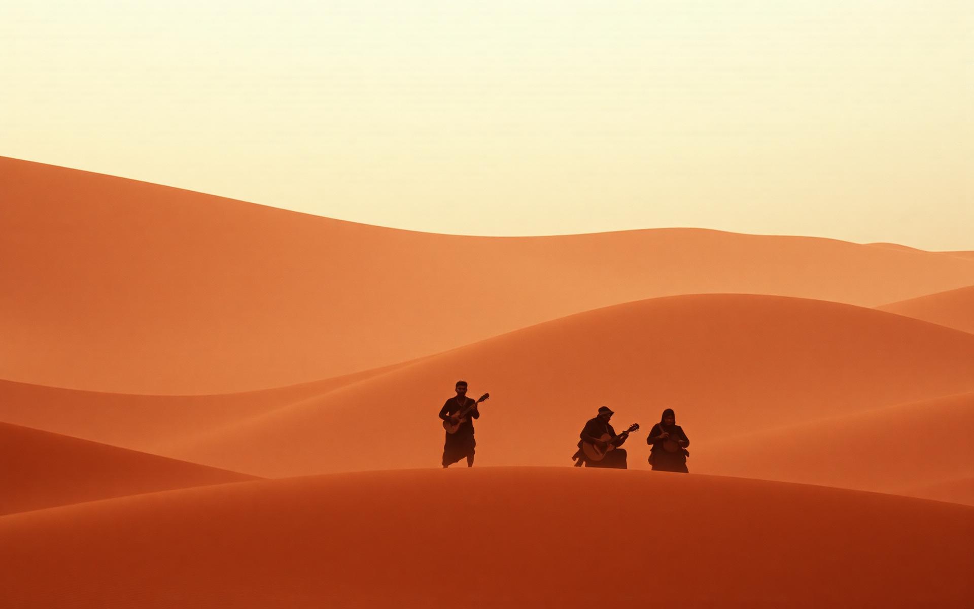 Musicians in the Sahara desert at golden hour